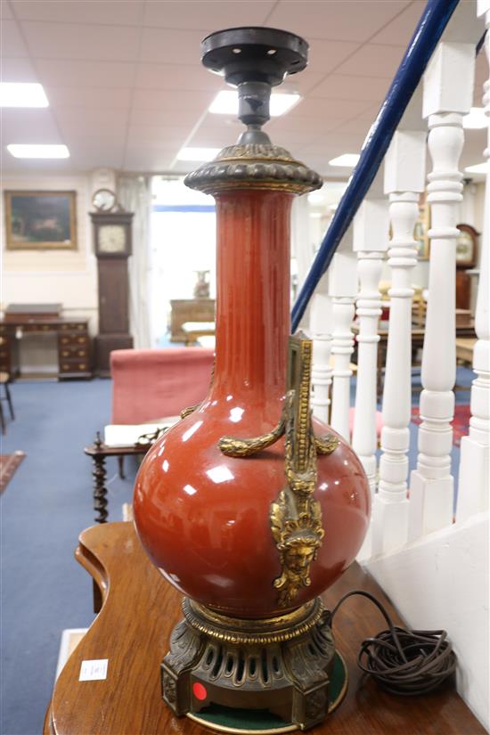 A Chinese ormolu mounted sang de boeuf table lamp, overall height 27.5in.